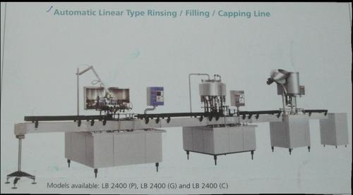 Automatic Linear Type Bottle Filling Machine Automatic Linear Type Bottle Filling Machine