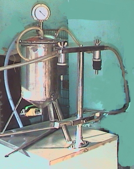 Vacuum Type Bottle Filling Machine Vacuum Type Bottle Filling Machine