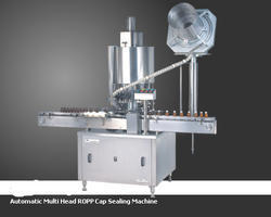 Fully Automatic Roll Cap Sealing Machines Fully Automatic Roll Cap Sealing Machines