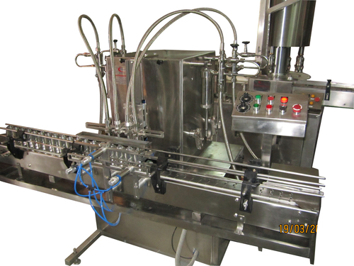Automatic Free Flow Liquid Filling Machines Automatic Free Flow Liquid Filling Machines