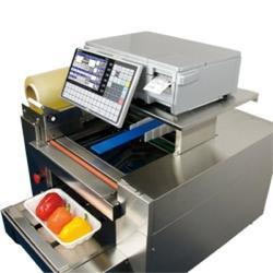 Tray Wrapping, Weighing and Labelling Tray Wrapping, Weighing and Labelling